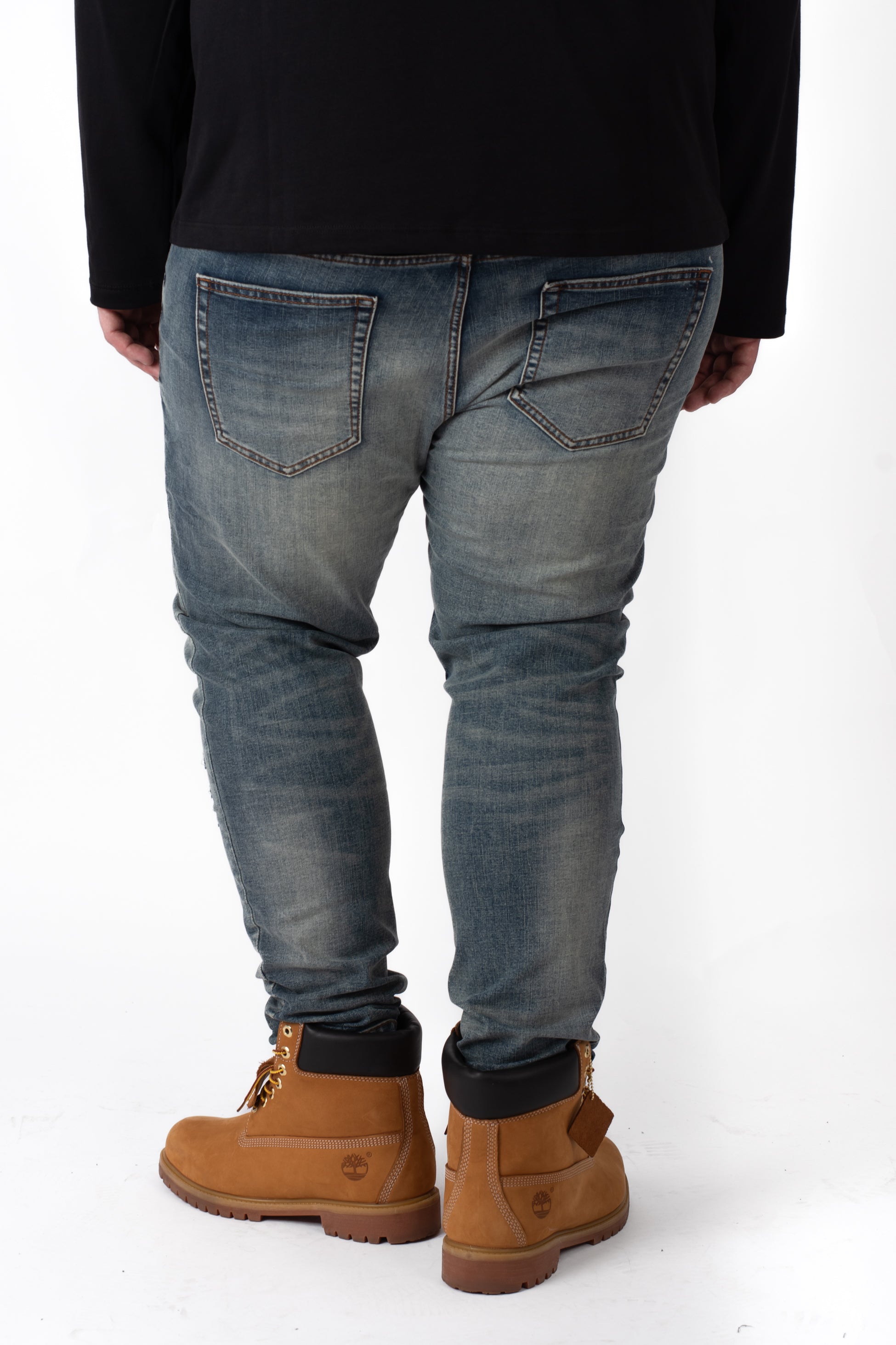 Retro Jeans strappati effetto vintage denim elasticizzato taglie forti uomo con boots